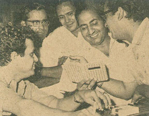 Mohd Rafi in a song rehersal with Shammi Kapoor, Hasrat, Jaikishan and others