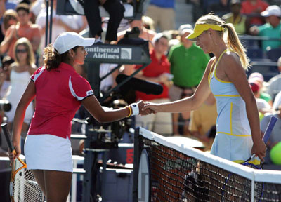 Sania Mirza shakes hand with Russia's Maria Sharapova
