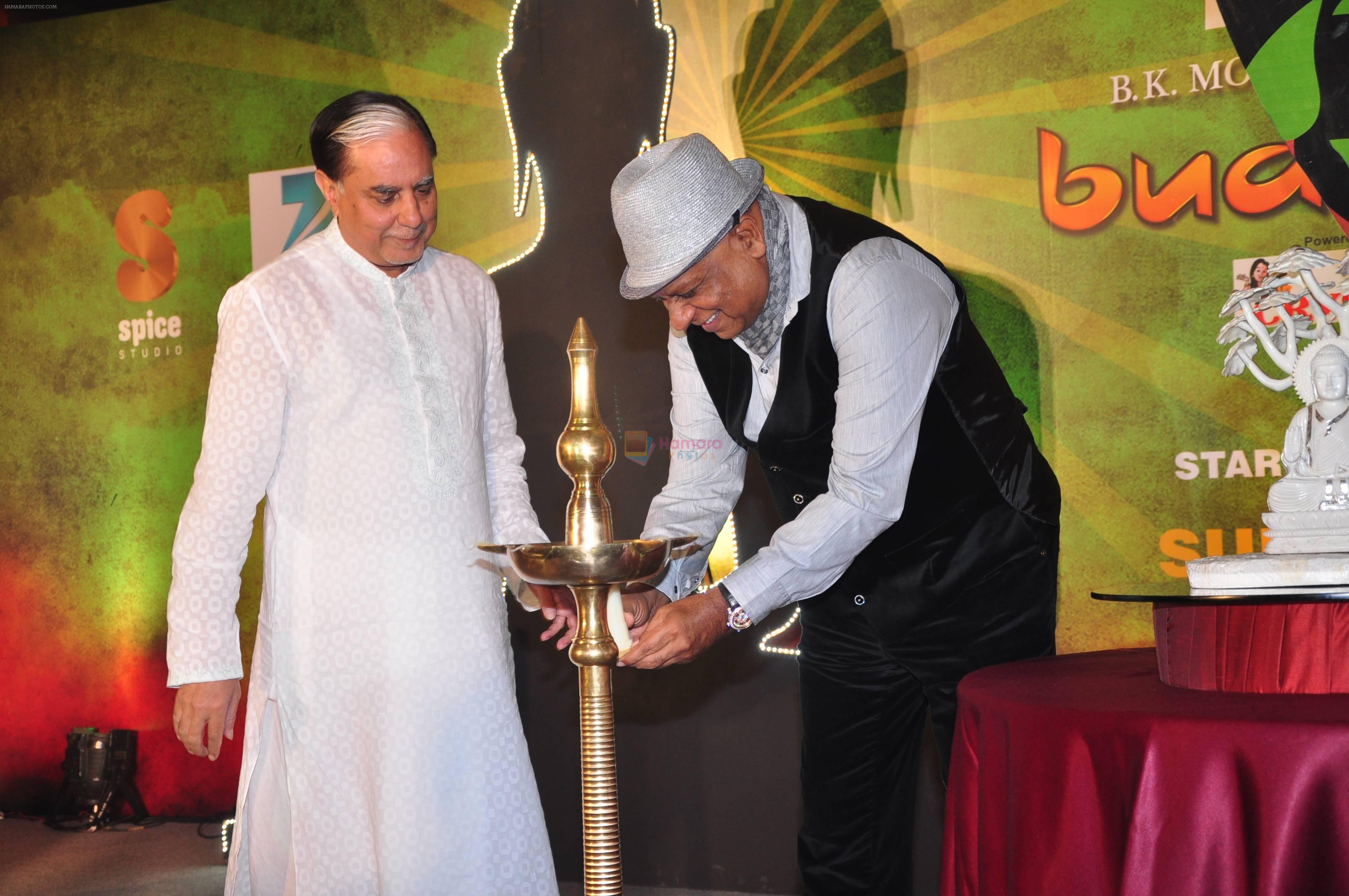 B.K Modi lighting the dia along with Subhash Chandra at Zee launches Buddha serial in J W Marriott in Mumbai on 2nd Sept 2013
