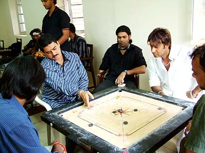 Ayub Khan and Ajay Devgan play carrom