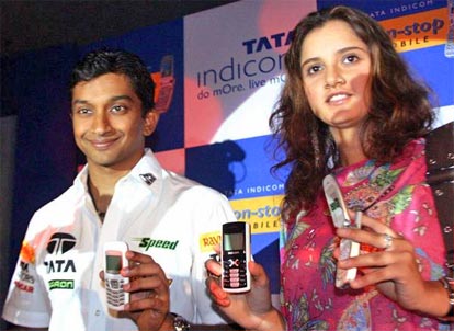  Sania Mirza and racing star Narayan Karthikeyan during the launch of Tata Indicom's non stop mobile celebration