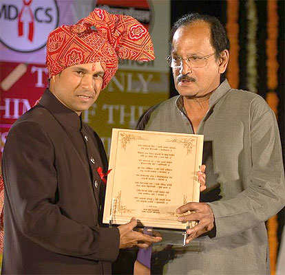 Sachin Tendulkar being presented a citation by former Indian cricket captain and coach Ajit Wadekar