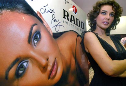 Rado brand ambassador Lisa Ray poses with the Rado Sintra Pave