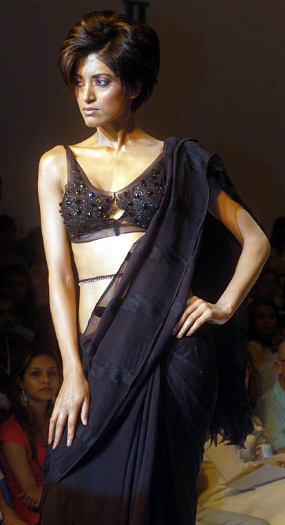 Model presents a creation by designer Rina Dhaka.