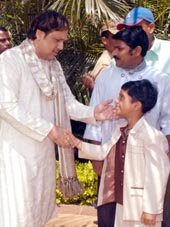 Actor and Congress MP Govinda with a young fan