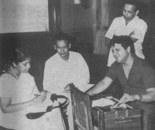 Asha rehearsaling a song with Jaikishan, Hasrat & others in the recording studio