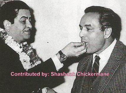 Rajkapoor with his soul voice Mukeshji in a party.
