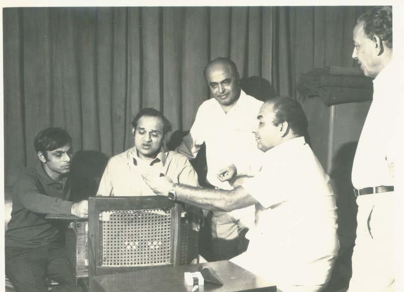 Mohd Rafi with Kalyan Ji Anand Ji rehearsing a song