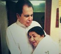 Lata sharing a happy moment with Dilip Kumar
