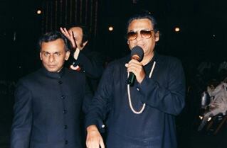 Kishoreda singing in a concert with Anandji