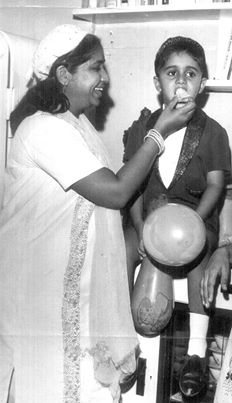 Asha Bhosale with her son