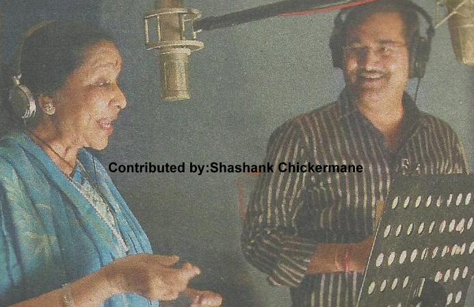 Asha with Sudesh Bhosale recording a song 