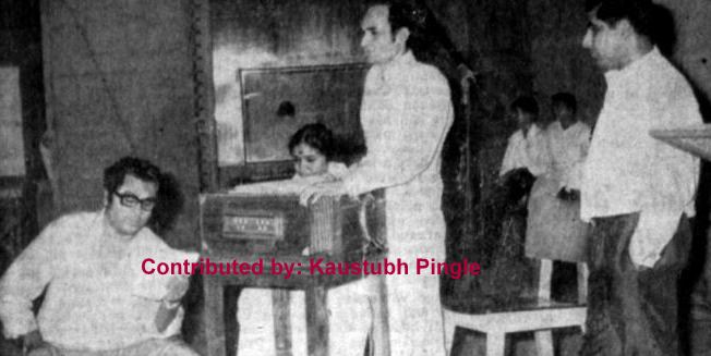 Kishoreda with Asha rehearsalling a song with Kalyanji in the recording studio