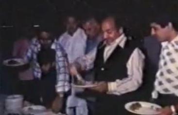 Mohdrafi having dinner with others in a wedding ceremony