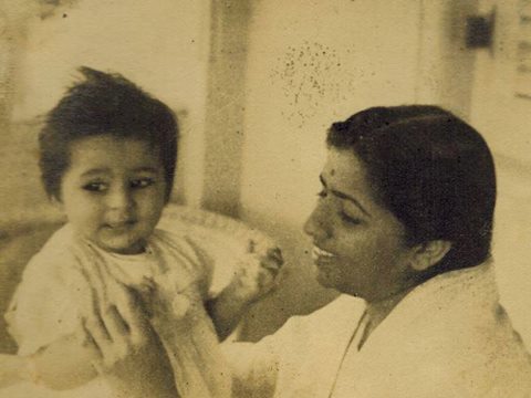 Lata playing with a child