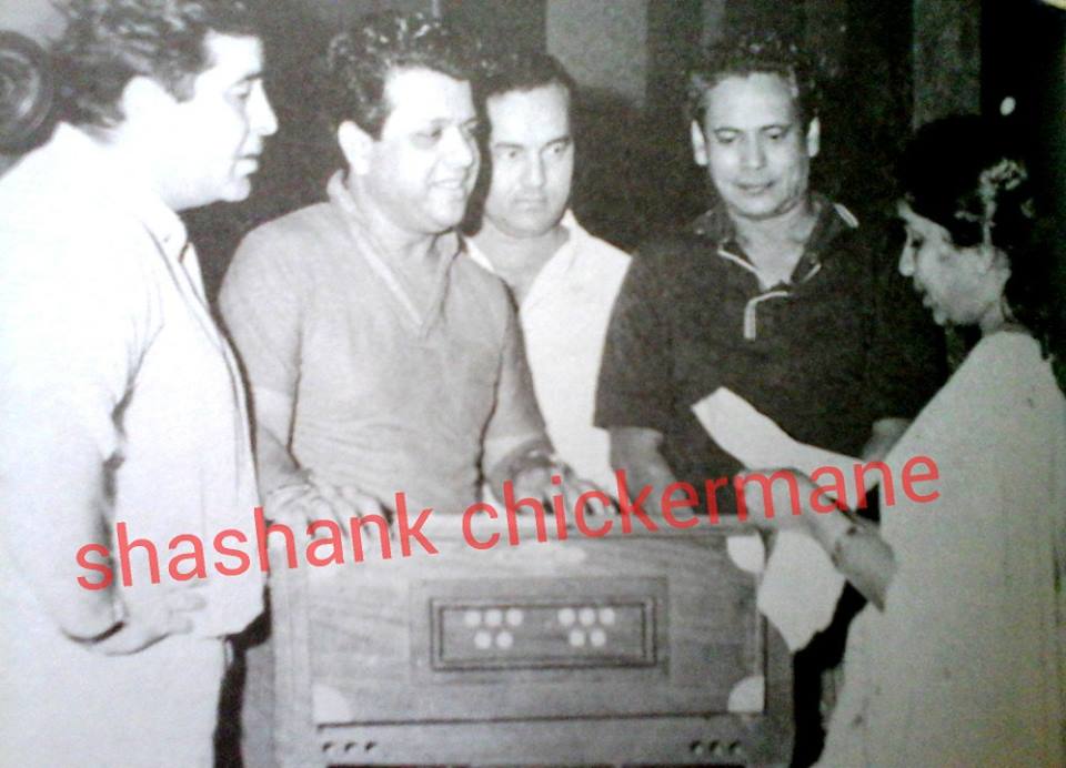 Mukesh with Asha rehearsalling a song with Shankar, Jaikishan & Hasrat Jaipuri