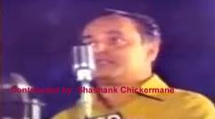 Mukesh singing in a concert