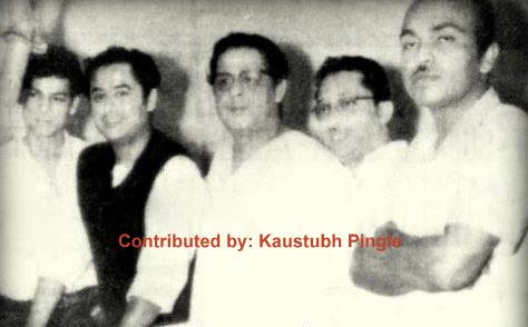 Kishore Kumar with others recording a song in the studio
