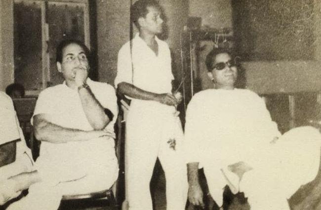 Rafi sitting with others