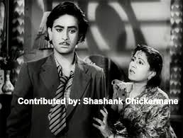Raj Kapoor with Madhubala in a film