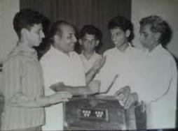 Mohdrafi rehearsalling a song with Sajjad Hussain & others