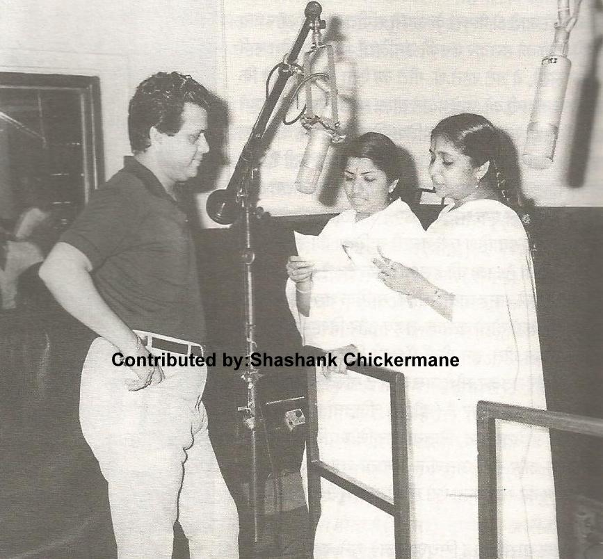 Lata with Asha recording a duet song with Jaikishan in the recording studio