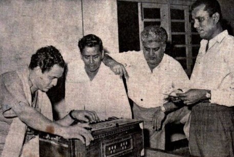Mukesh with Shailendra, Mr.Raval & others rehearsalling a song