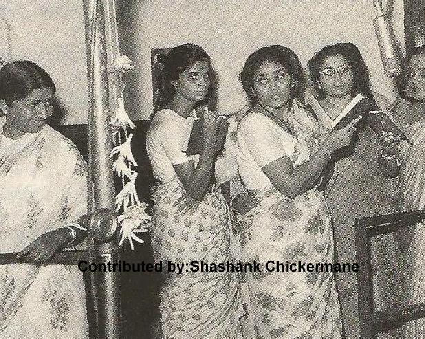 Lata with others in the recording studio