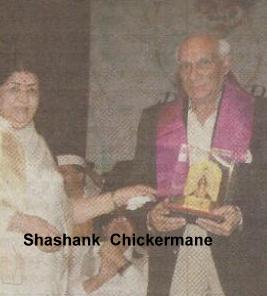 Yash Chopra receiving award from Lata Mangeshkar