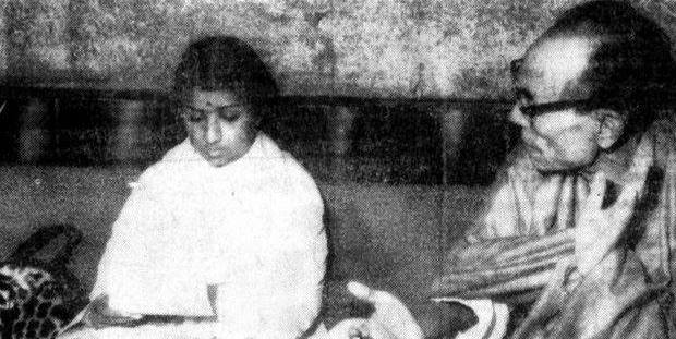 SD Burman discussing a song with Lata in the recording studio