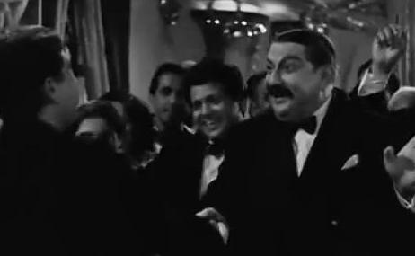 Jaikishan with others enjoying the party in the film scene 'Shree 420'