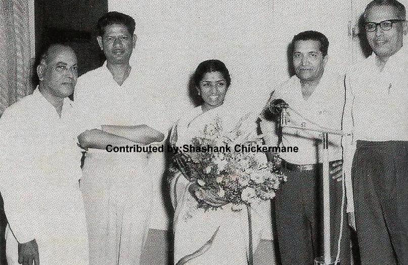 Lata with others in the recording studio