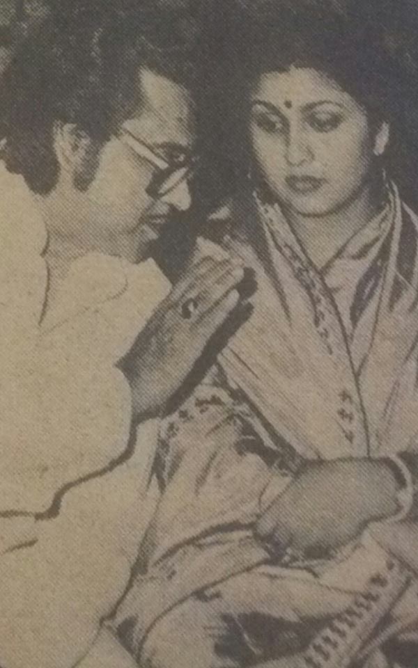Kishorekumar discussing with his wife Leena