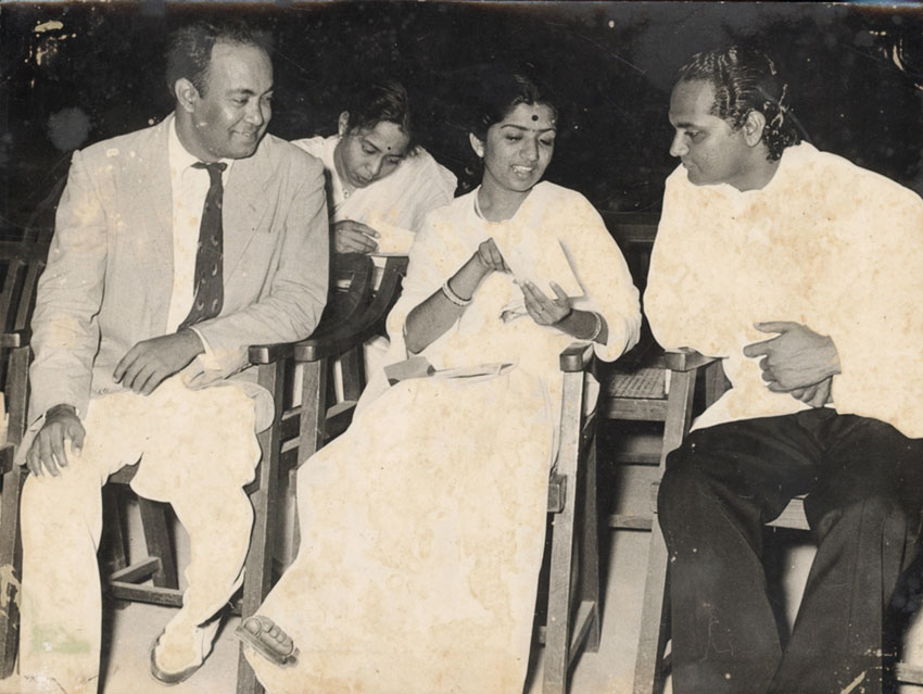 Lata discussing with SD Batish & musician Anthony Gonsalves