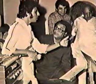 Kishoreda discussing a song with Babla, Anjaan & others in the recording studio