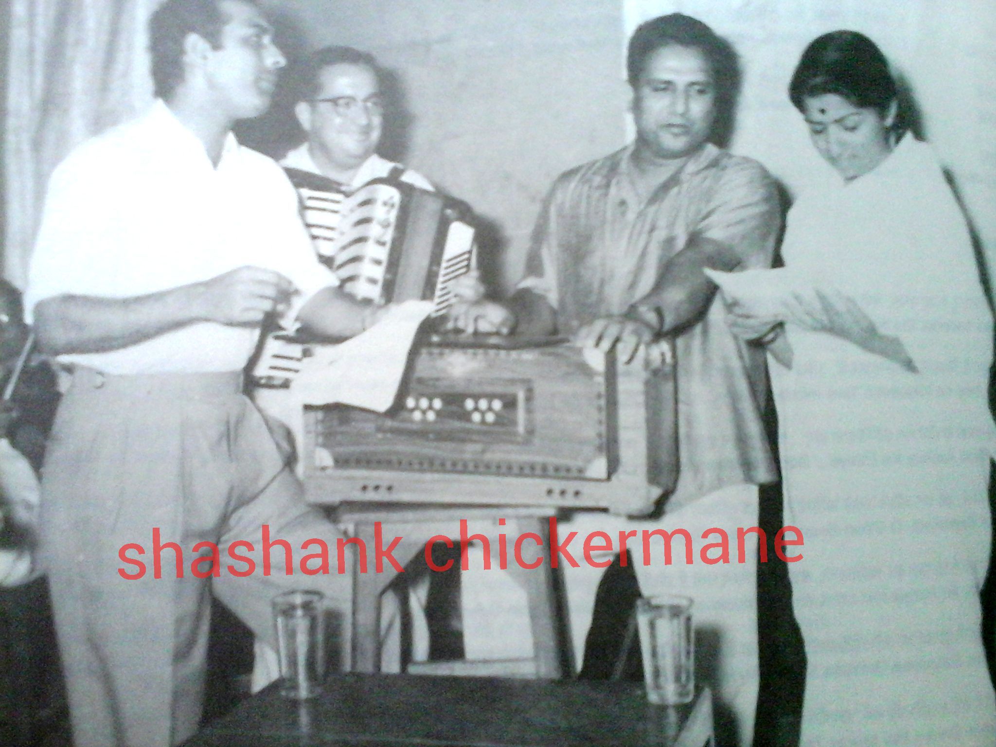 Talat Mohd with Lata in the recording studio alongwith Shankar.
