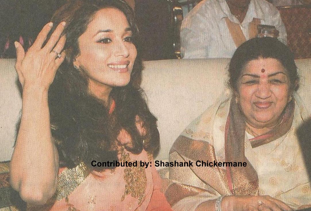 Lata with Madhuri Dixit in a programme