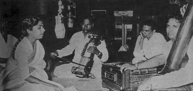 Lata Mangeshkar with Shankar in a song recording