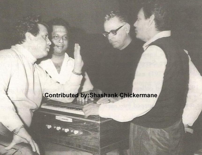 Jaikishan discussing with Hasrat Jaipuri, Satish Wagle & others in the recording studio