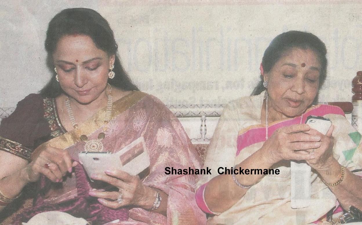 Asha with Hema Malini in a function