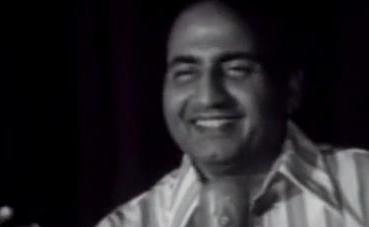 Mohammad Rafi singing in a stage show