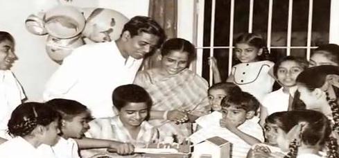 Shailendra with his wife in his son's birthday party at home