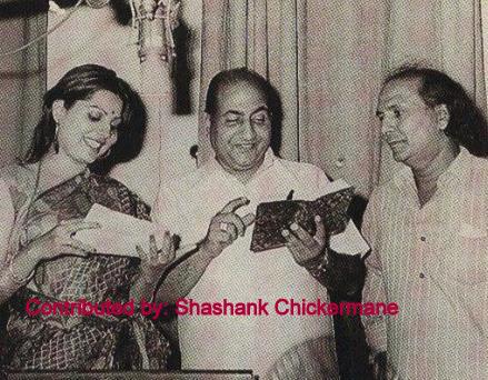 Mohd Rafi with Sulakshana Pandit recording a song with Shankar in the studio