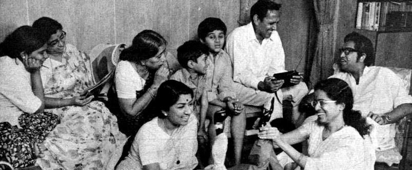 Lata with her sisters, mother, brother enjoying in the house