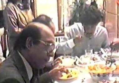 Talat Mohd with his son having dinner at a party