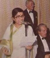 Lata singing in a stage show