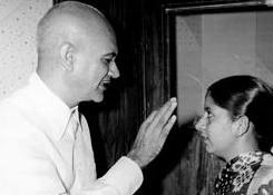 OP Nayyar discussing with Dilraj Kaur in the recording studio