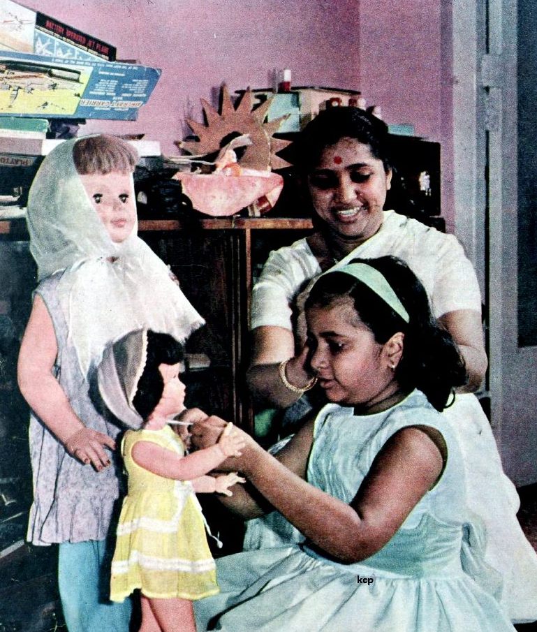 Asha Bhosale with her children