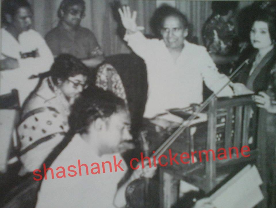 Usha Mangeshkar & Sulakshana Pandit rehearsalling a song with music director Shankar in the recording studio
