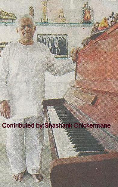 Pyarelal with his piano at home